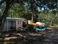 A Kiwi Bach on Rangitoto's shoreline